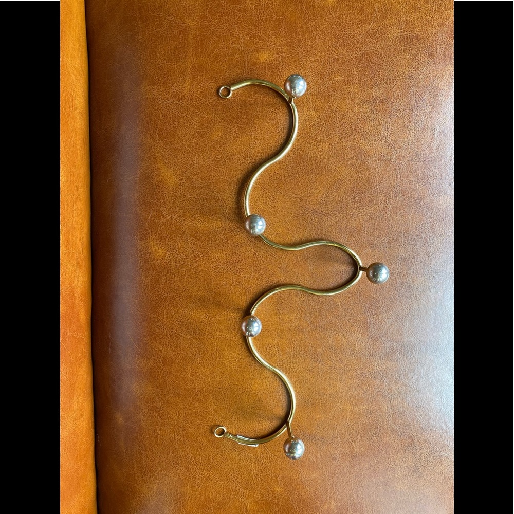 Urban Outfitters gold and silver curvy hooks